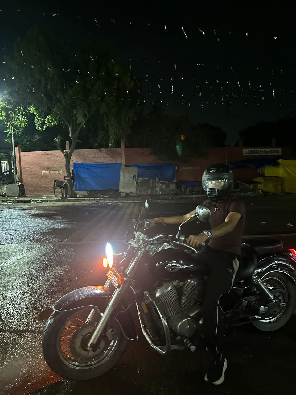 Sachman on his cruiser at night